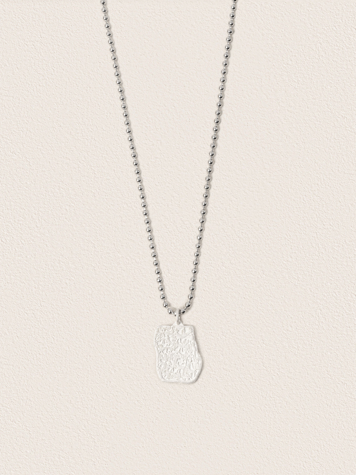 Sacred Carvings of Lhasa Chokpori (Mountain) Necklace