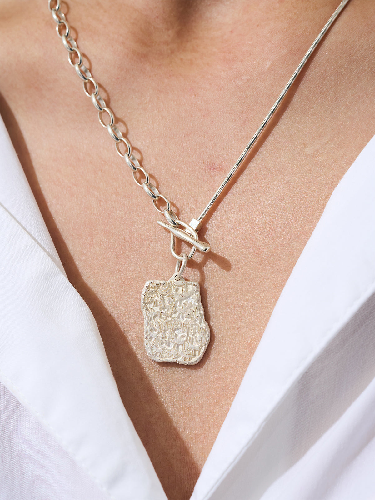 Sacred Carvings of Lhasa Chokpori (Mountain) Necklace