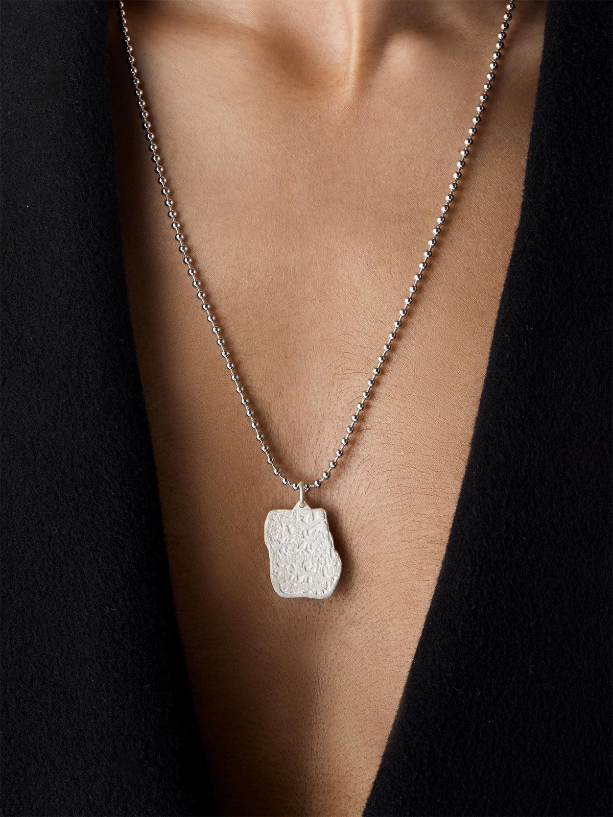 Sacred Carvings of Lhasa Chokpori (Mountain) Necklace