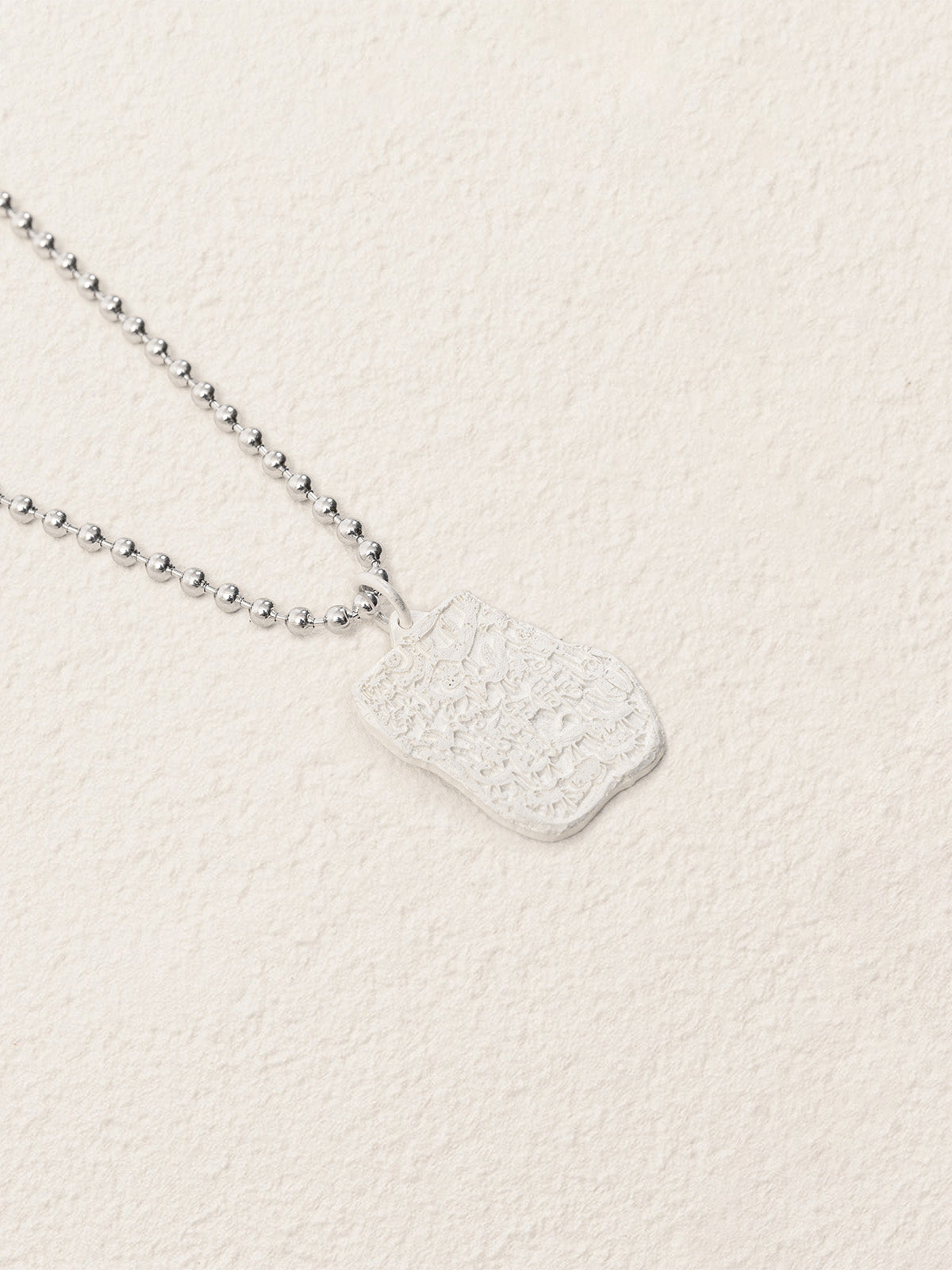 Sacred Carvings of Lhasa Chokpori (Mountain) Necklace