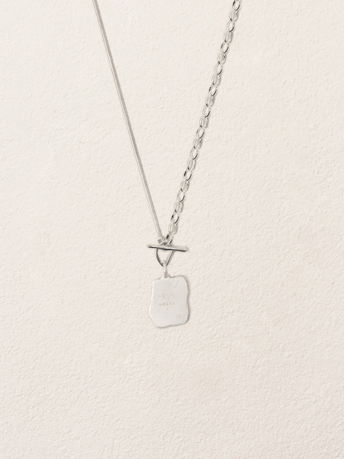 Sacred Carvings of Lhasa Chokpori (Mountain) Necklace