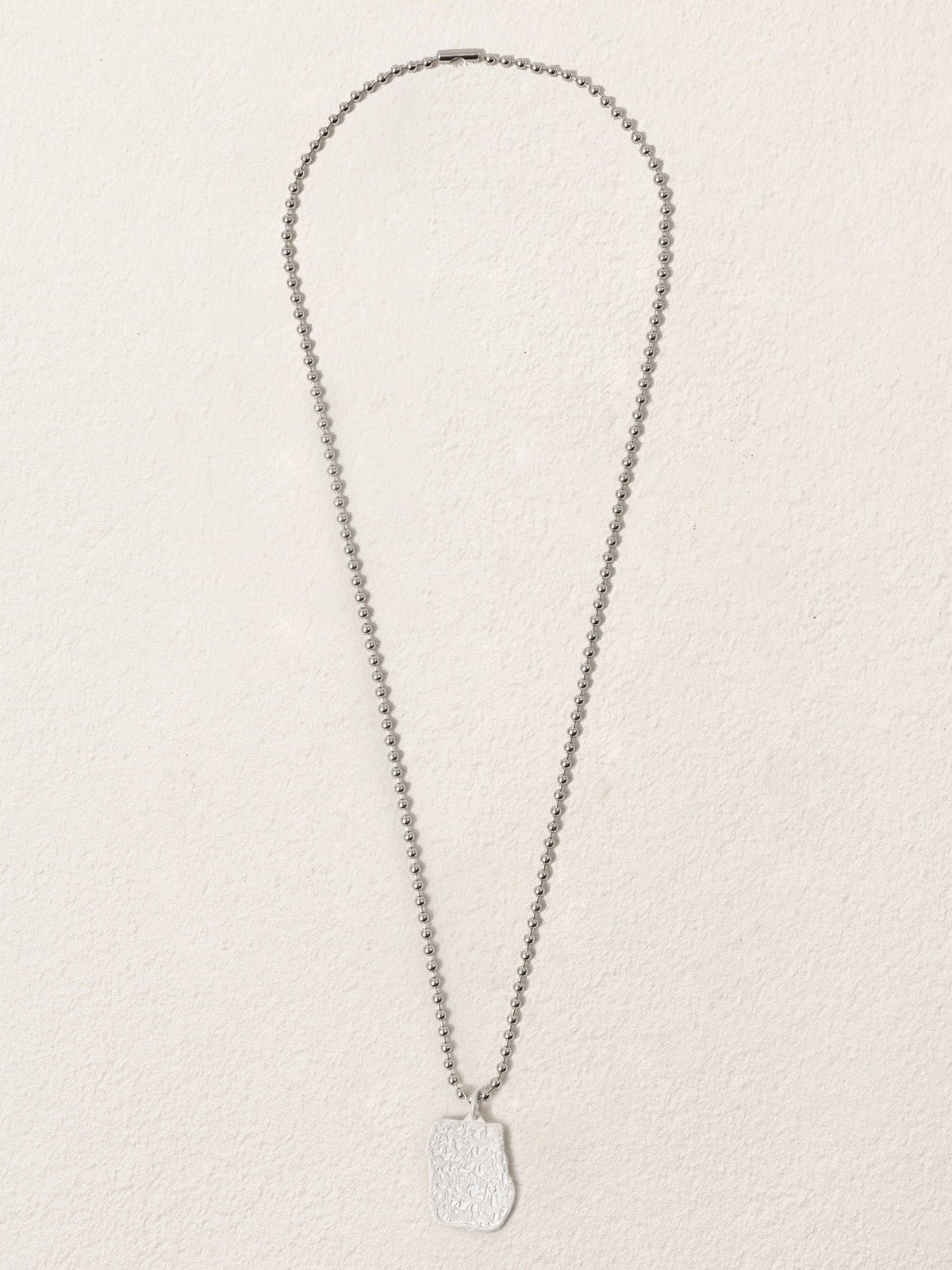 Sacred Carvings of Lhasa Chokpori (Mountain) Necklace