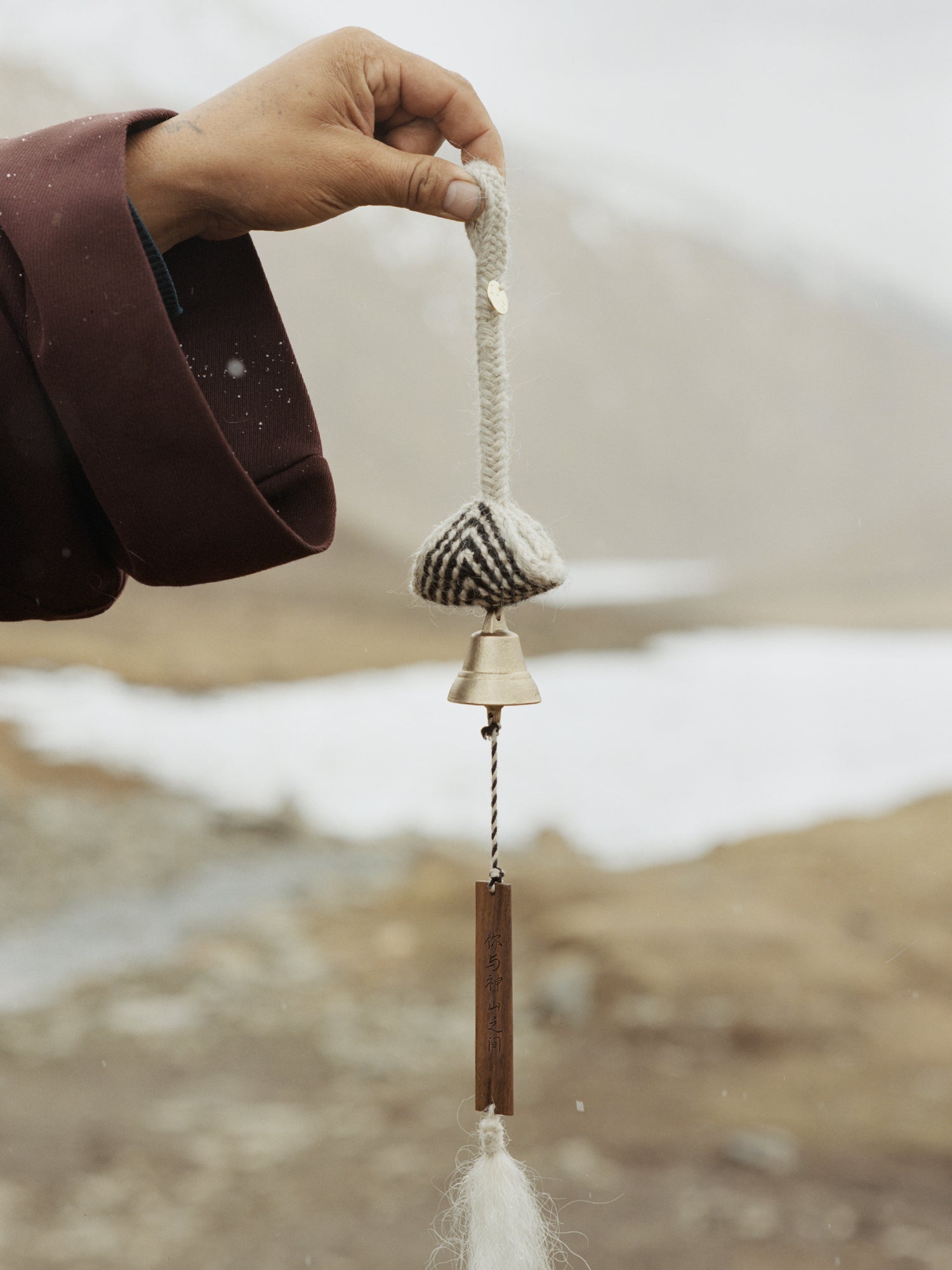 Handwoven Urdo Brass Wind Chime with Stone