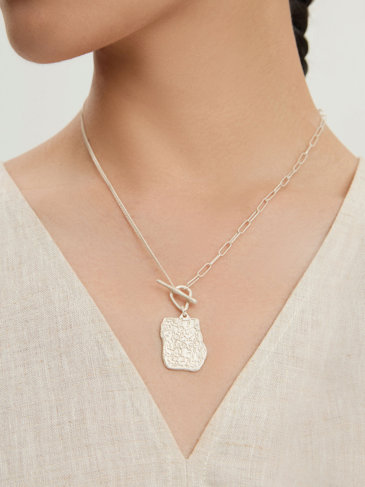 Sacred Carvings of Lhasa Chokpori (Mountain) Necklace