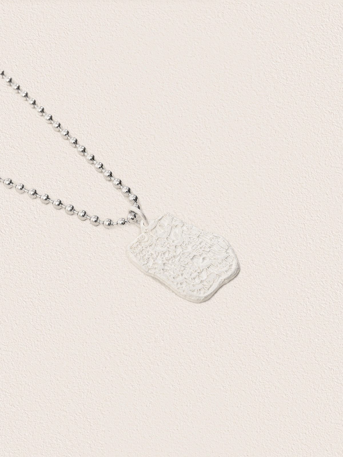 Sacred Carvings of Lhasa Chokpori (Mountain) Necklace