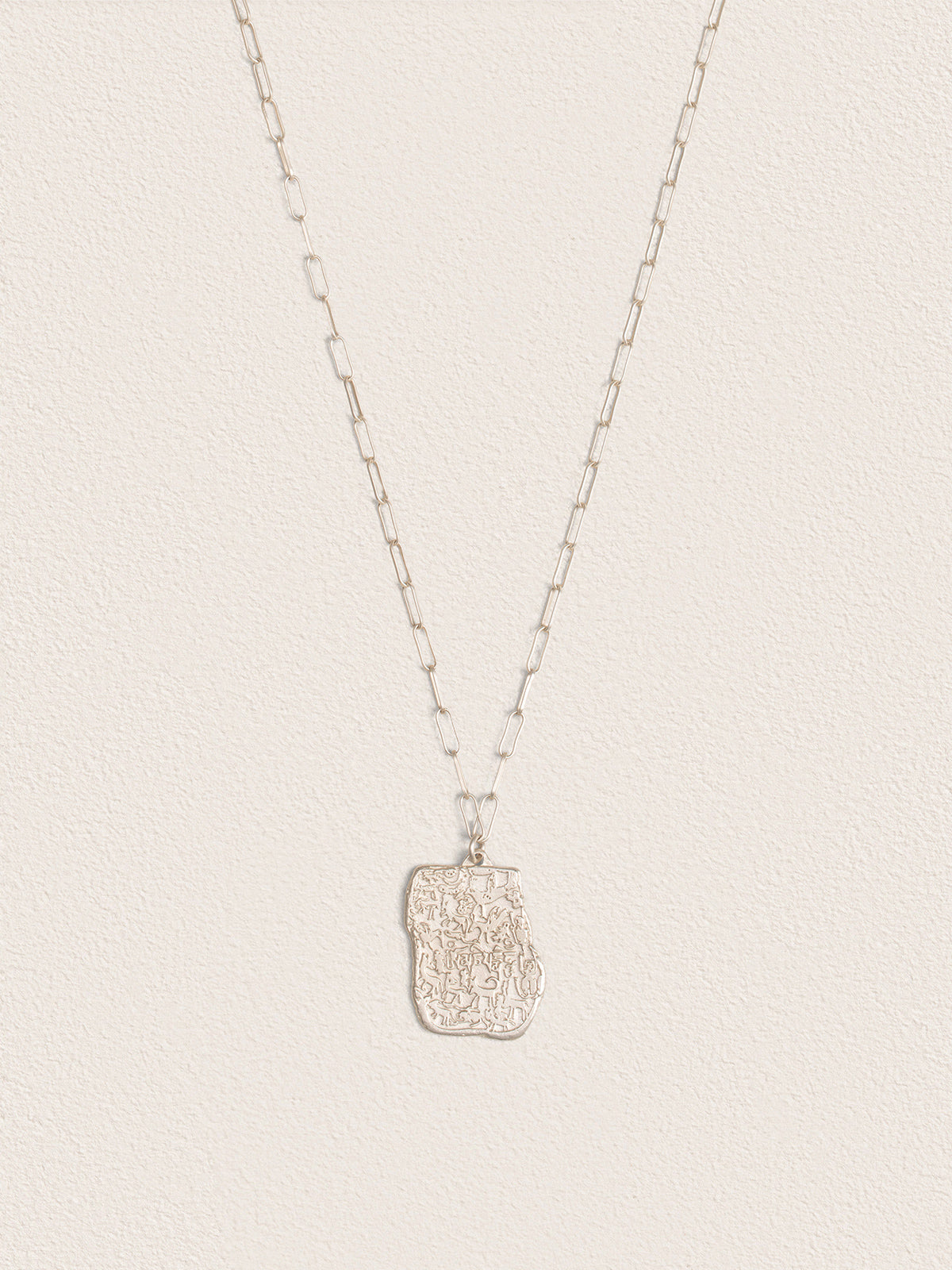 Sacred Carvings of Lhasa Chokpori (Mountain) Necklace
