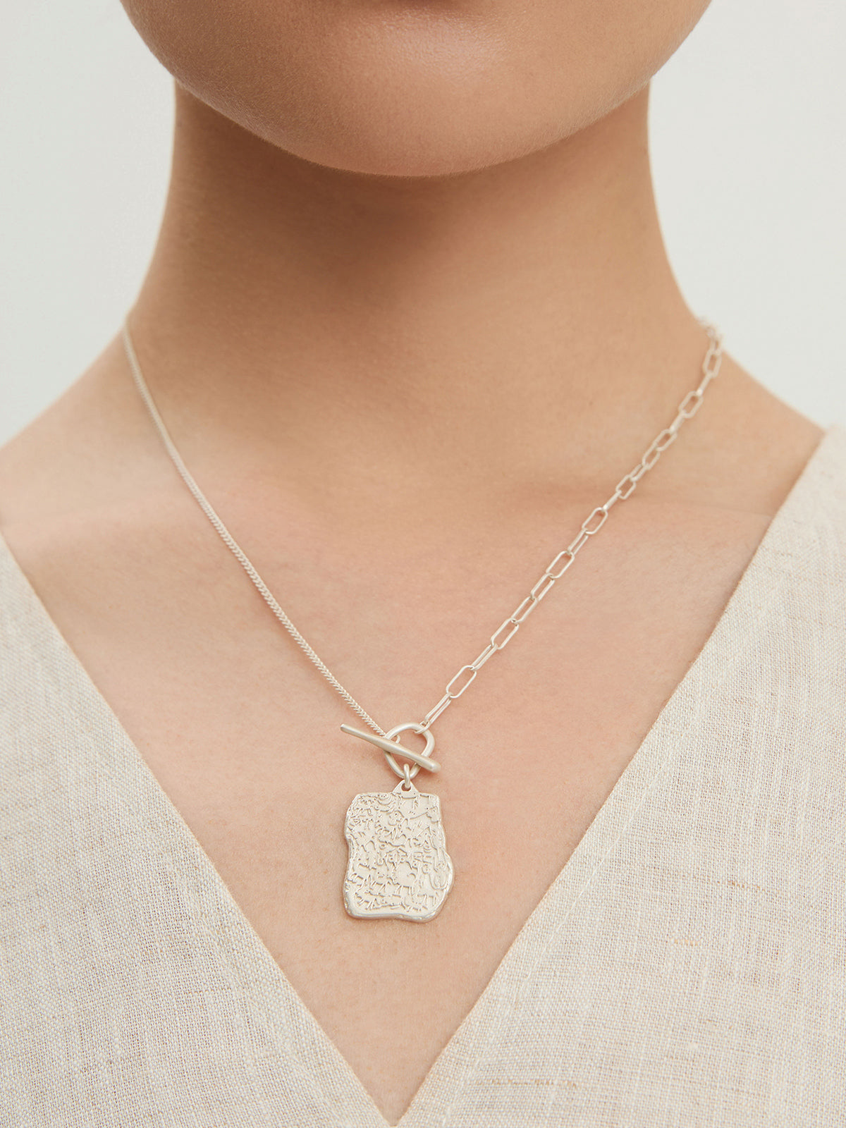 Sacred Carvings of Lhasa Chokpori (Mountain) Necklace