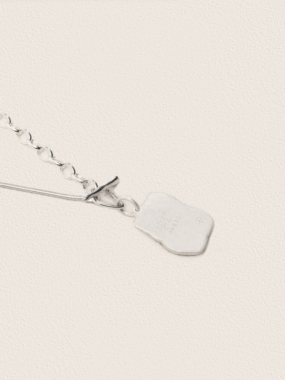 Sacred Carvings of Lhasa Chokpori (Mountain) Necklace