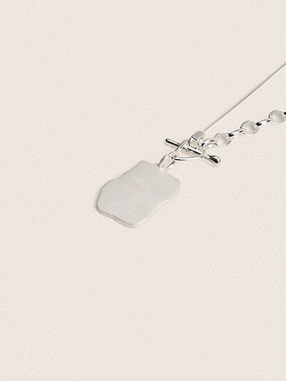 Sacred Carvings of Lhasa Chokpori (Mountain) Necklace